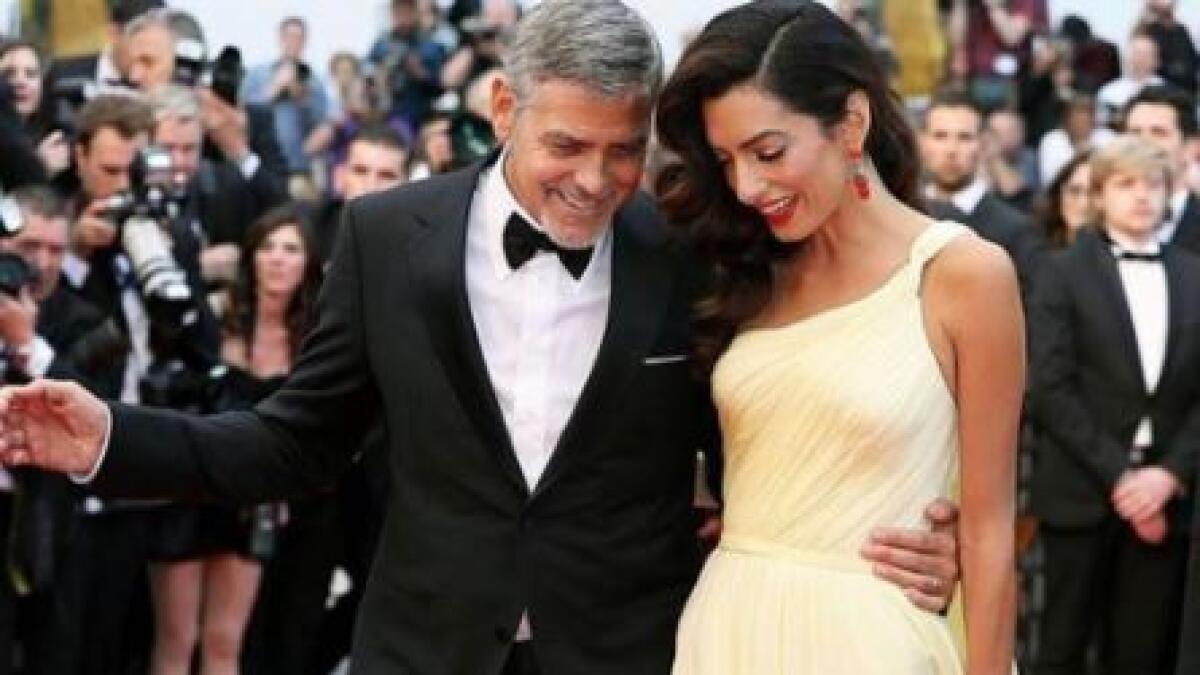 George Clooney with wife Amal Clooney 
