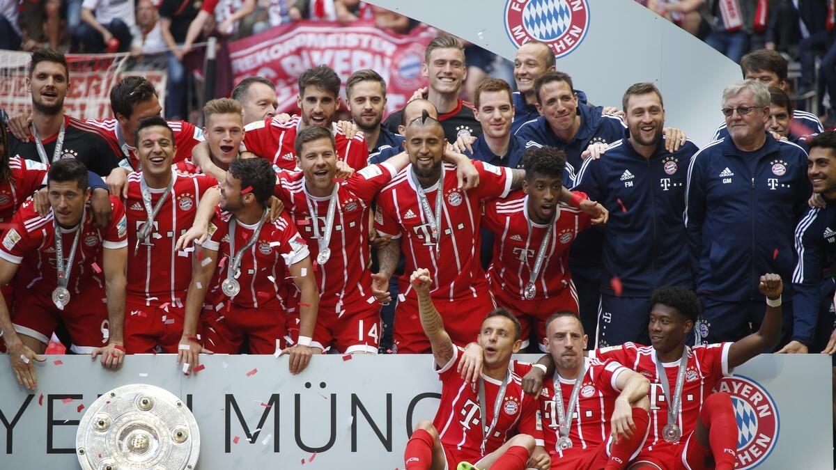 Champions Bayern set another record; Dortmund clinch Champions League place