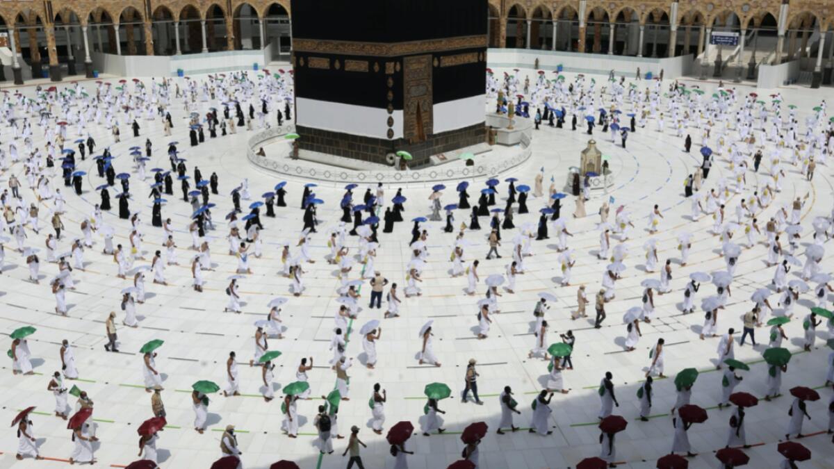 Pilgrims circumambulating around the Holy Kaaba, at the centre of the Grand Mosque in the holy city of Makkah, ahead of the annual Haj pilgrimage. Mask-clad pilgrims began the annual Haj, dramatically downsized this year as the Saudi hosts strive to prevent a coronavirus outbreak during the five-day pilgrimage. Photo: AFP