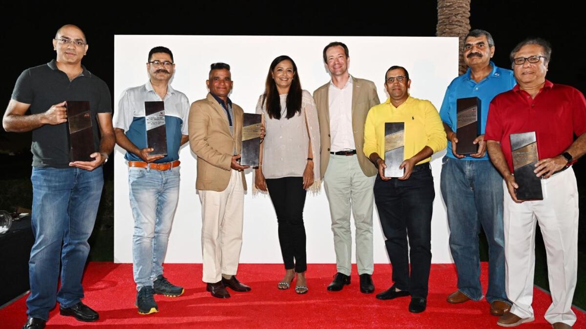 Chief guest Pierre Aymeric with winners and officials of the Indian Golfers Society after the season finale at the Emirates Golf Club. — Supplied photo