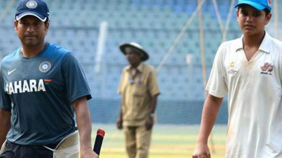 Cricket icon Sachin Tendulkar with son Arjun. - Twitter