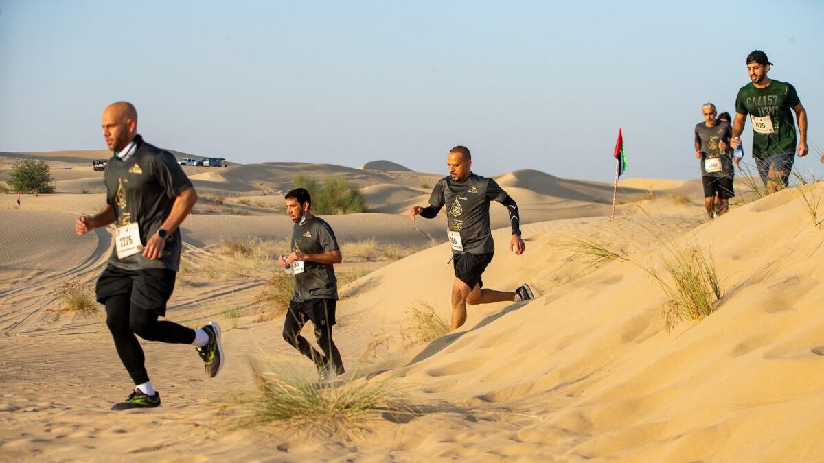 Participants in action during Al Marmoom Dune Run. — Supplied photo