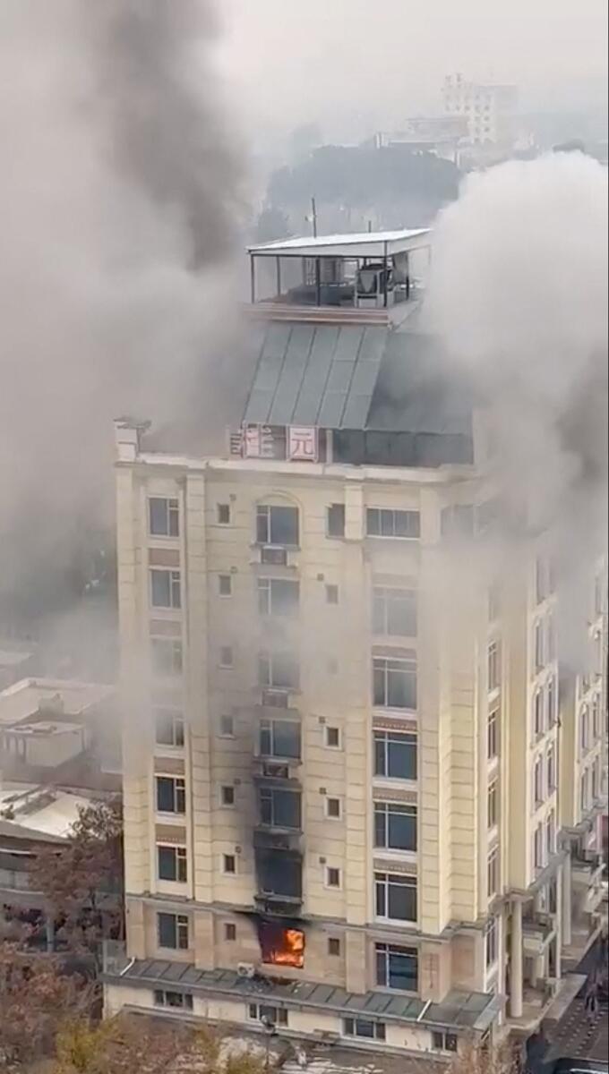 View of a hotel fire in Shahr-e-Naw neighbourhood where gunfire was also heard in Kabul on Monday in this still image from social media video. — Reuters