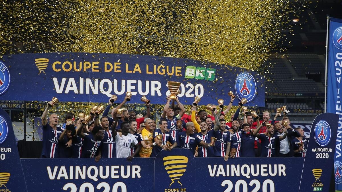 PSG's players celebrate after winning the French League Cup