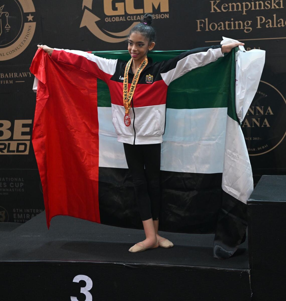 The UAE's Lamia Tariq Malallah celebrates on the podium. — Supplied photo