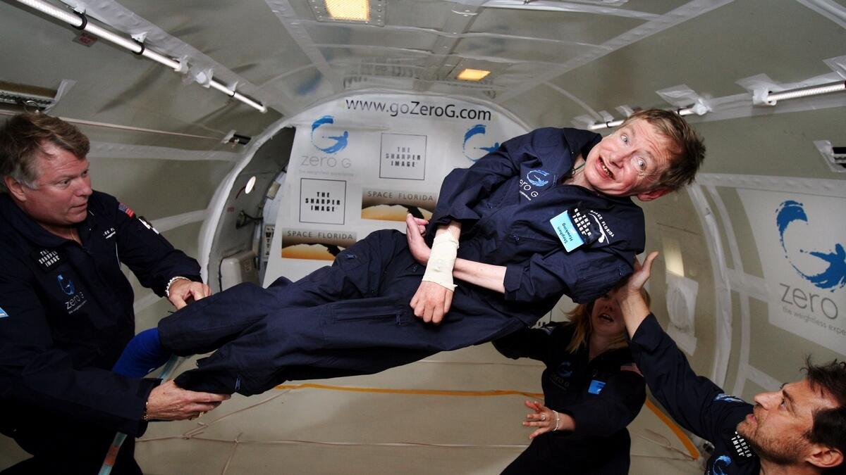 British cosmologist Stephen Hawking experiences zero gravity during a flight over the Atlantic Ocean.