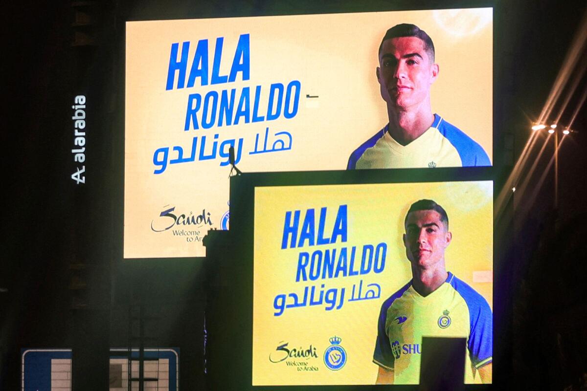 A picture taken early January 3, 2023 in Riyadh, shows billboards welcoming the arrival of Cristiano Ronaldo to Arabia's Al Nassr club. Photo: AFP