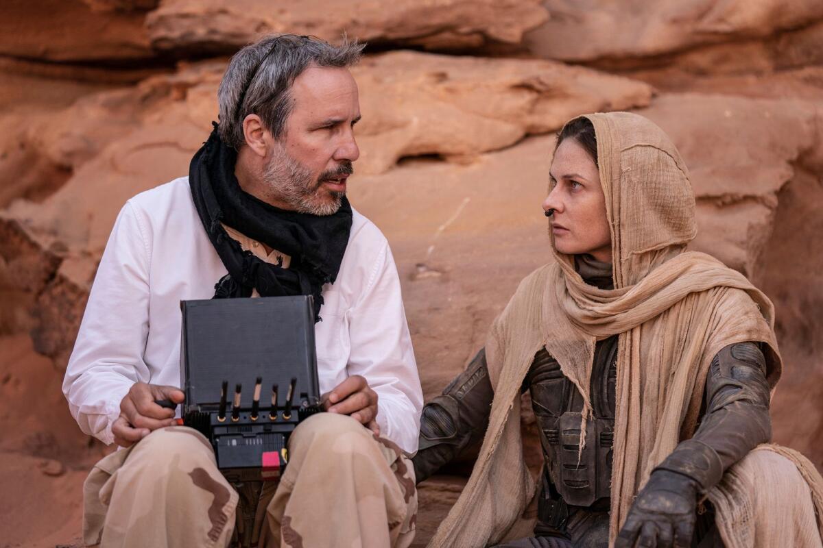 Denis Villeneuve and Rebecca Ferguson on the sets of Dune: Part Two