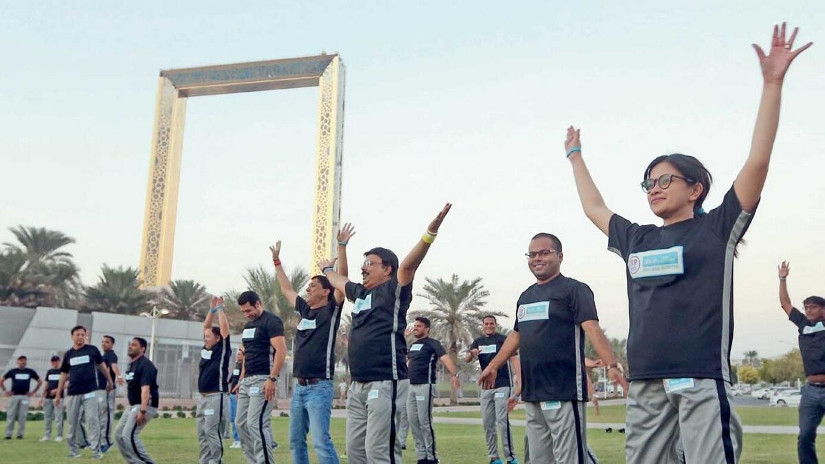 Baskin Robbins employees doing a fitness camp at the Zabeel Park as part of the Dubai Fitness Challenge. — Photo by Dhes Handumon