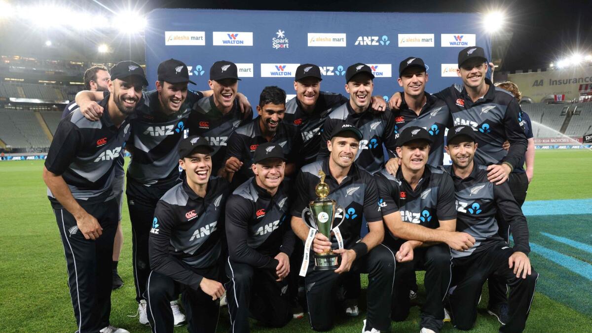 New Zealand's players celebrate their series victory after the third Twenty20 match against  Bangladesh in Auckland. —AFP