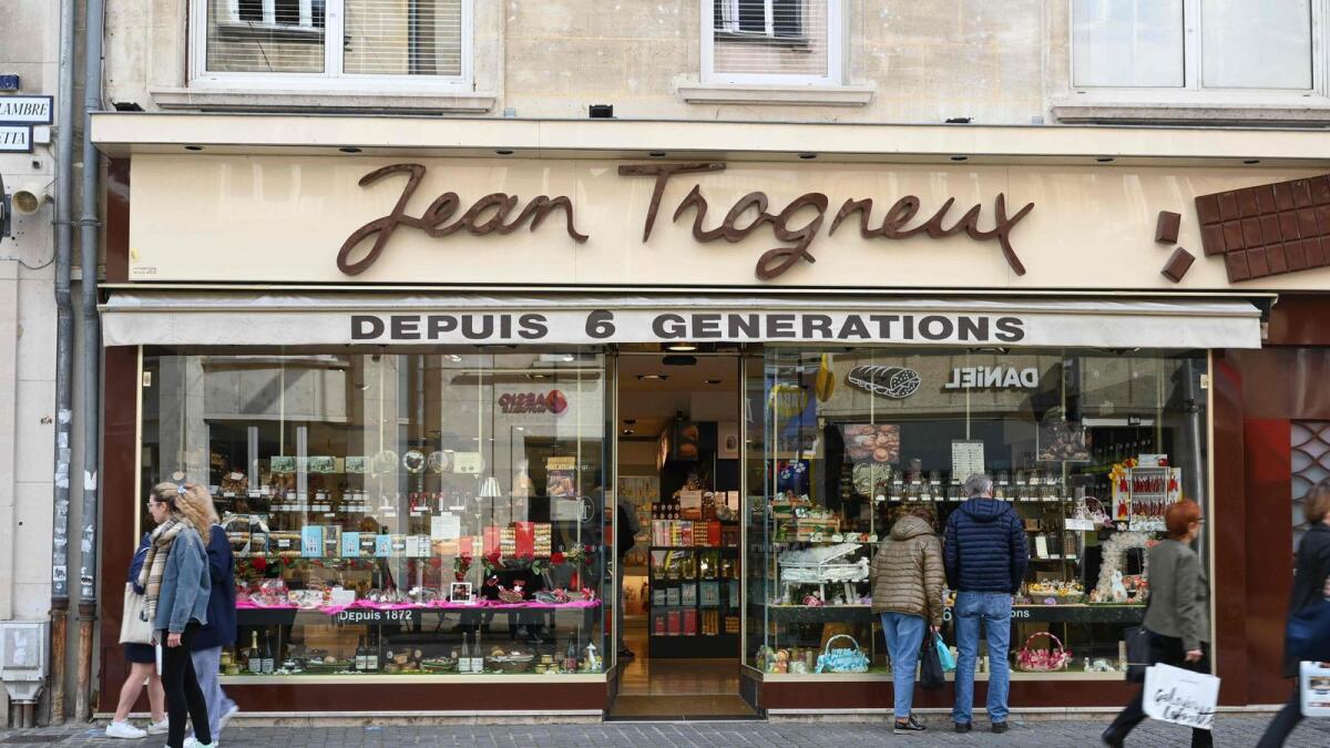 A picture shows a chocolate shop owned by French first lady Brigitte Macron's grandnephew Jean-Baptiste Trogneux who was attacked a day before by anti-government protesters, in Amiens on Tuesday. — AFP