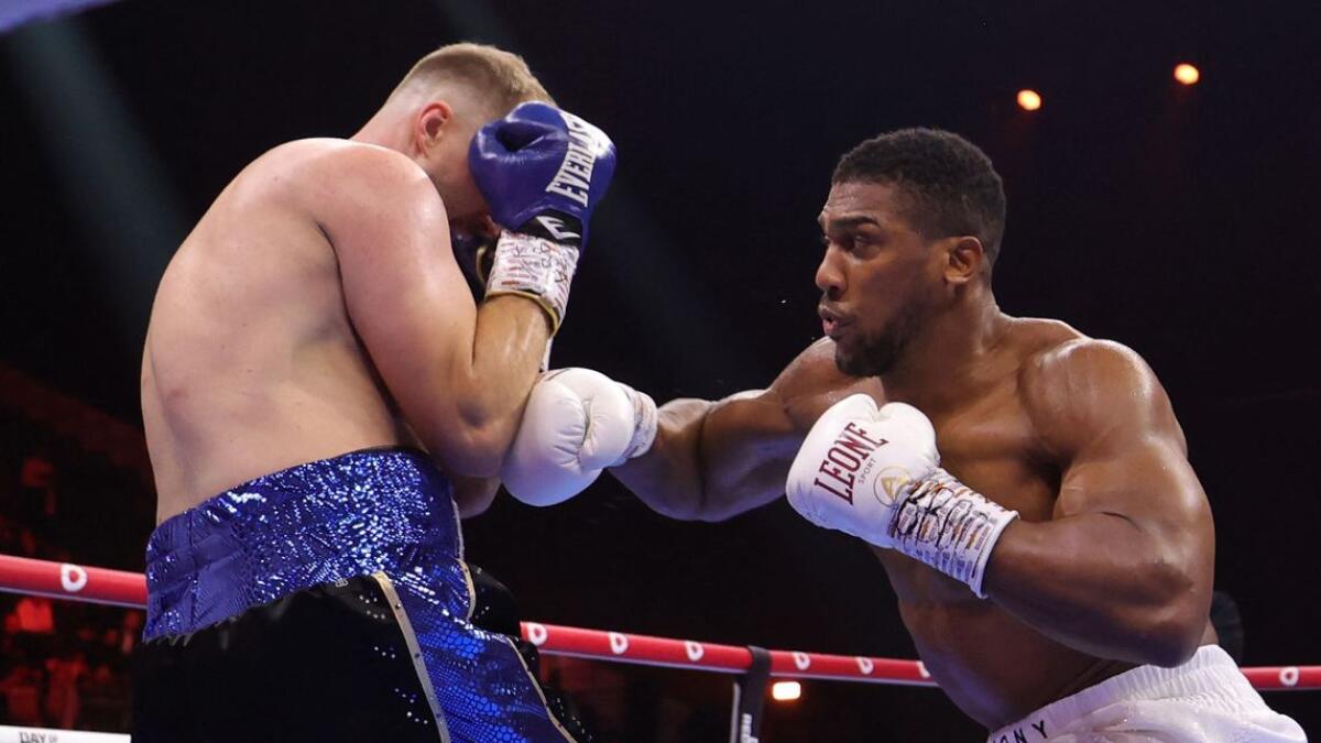 Britain's Anthony Joshua (R) attacks the body of Sweden's Otto Wallin during their heavyweight fight at the Kingdom Arena in Riyadh in December, 2023. - AFP File