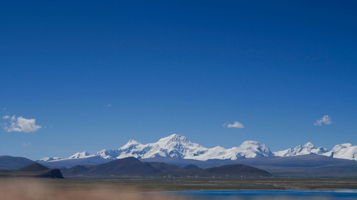 Mount Shishapangma is seen from Baiku Lake in Xigaze, Tibet. — AP
