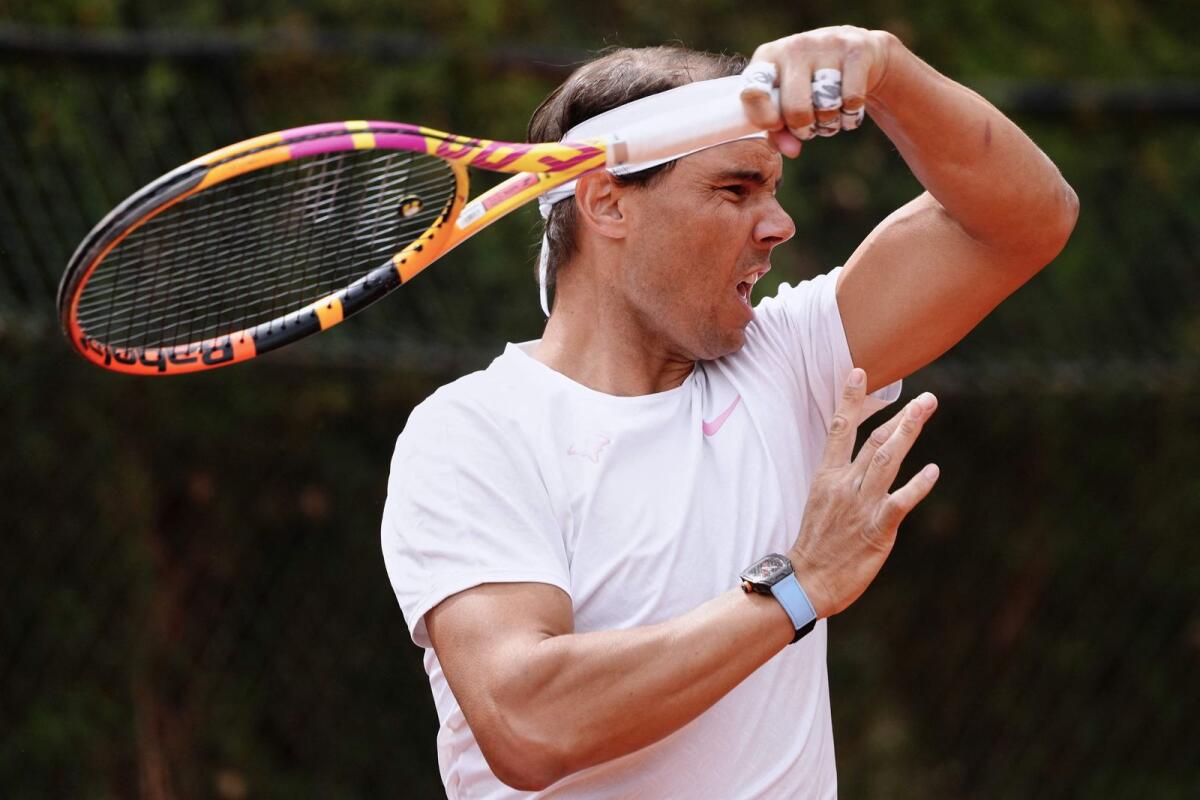 Spain's Rafael Nadal plays a forehand return during a training session in Barcelona. — AFP