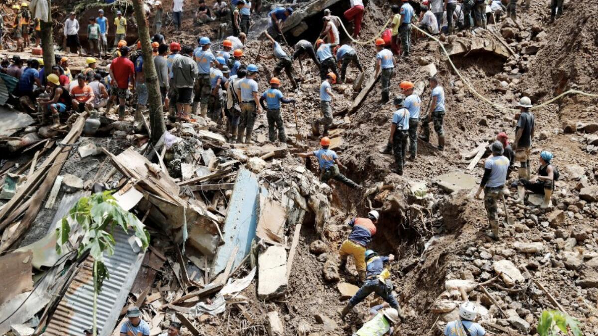 12 killed, dozens missing in new Philippine landslide