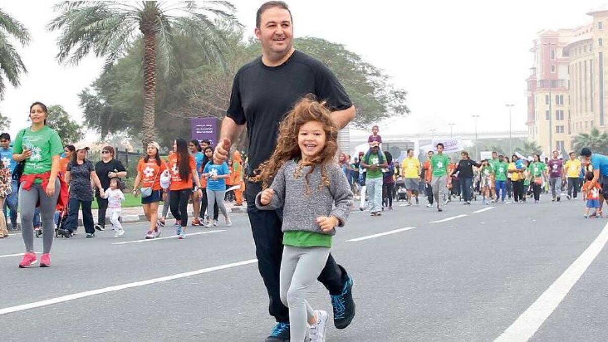 Over 14,000 residents walk 3km to raise funds for child education