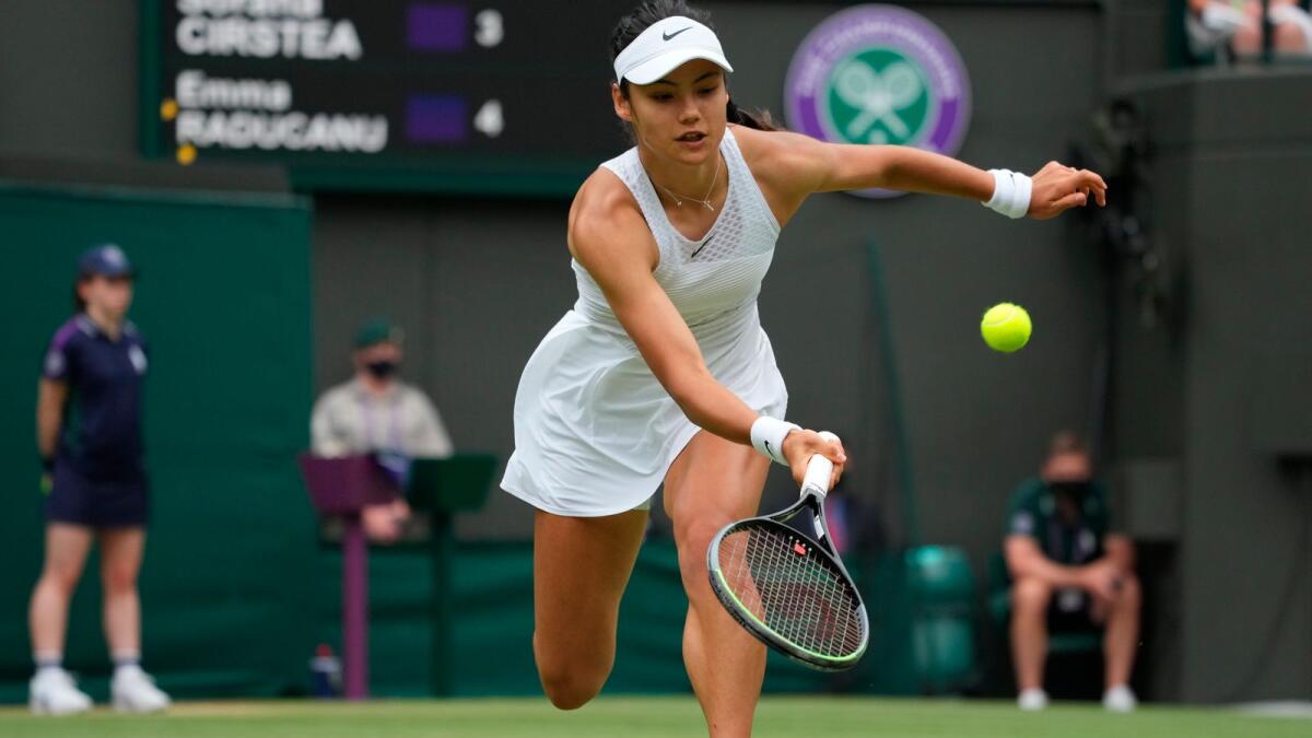Britain's Emma Raducanu plays a return to Romania's Sorana Cirstea during the women's singles third round match. — AP
