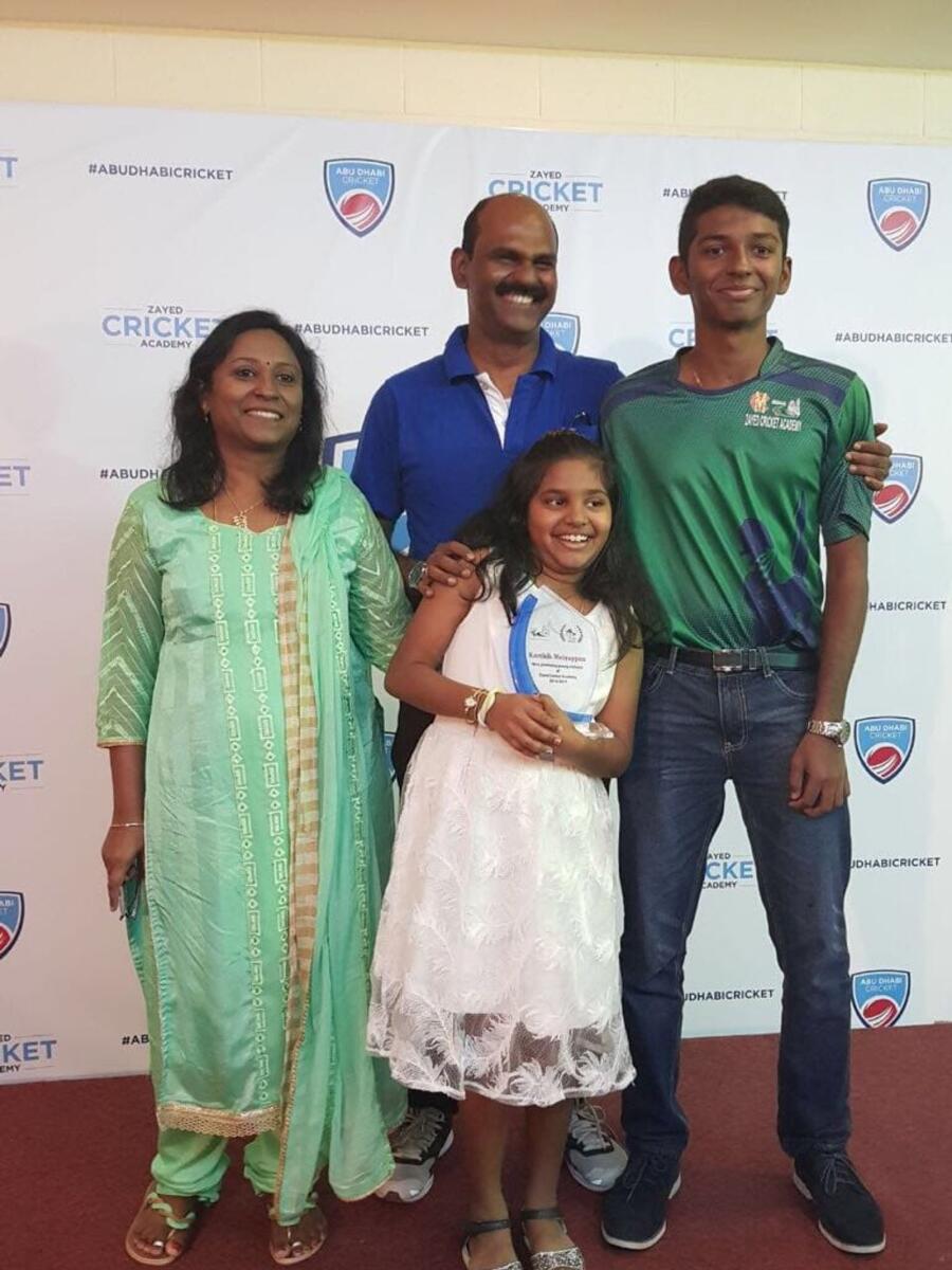 Karthik Meiyappan with his parents and sister.