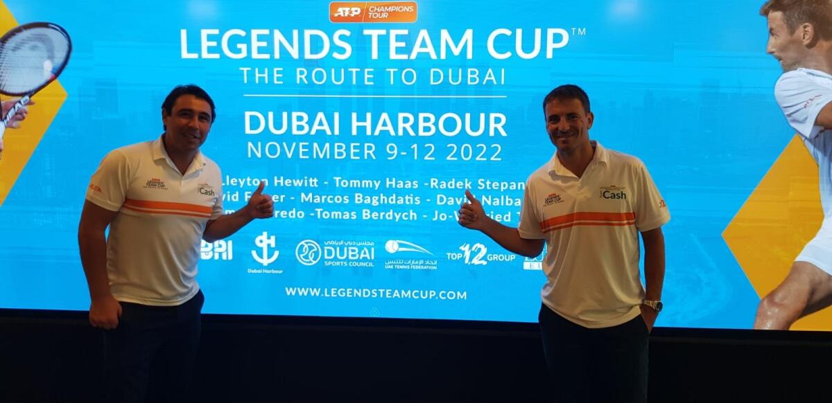 Marcos Baghdatis (left) poses with former Spanish player Tommy Robredoduring a press conference in Dubai. (Photo by Rituraj Borkakoty)