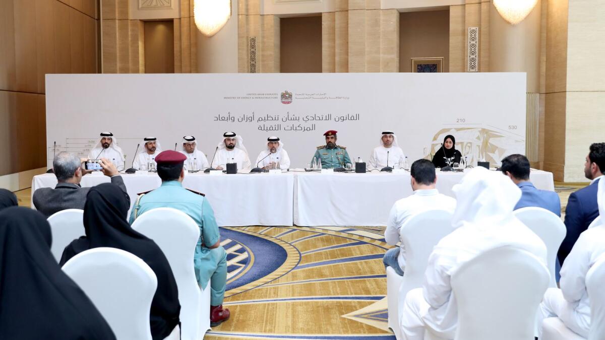 Minister Suhail bin Mohammed Al Mazrouei and other officials at a press conference to announce the details of the new federal law.