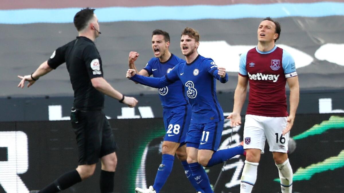 Chelsea’s Timo Werner (centre) celebrates after scoring the winner during the Premier League match against West Ham United. — AP