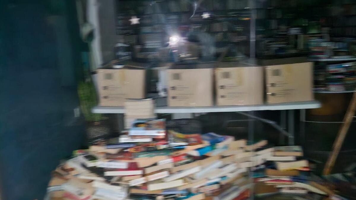 Damaged books at Preloved Books after the floods. — Supplied photos