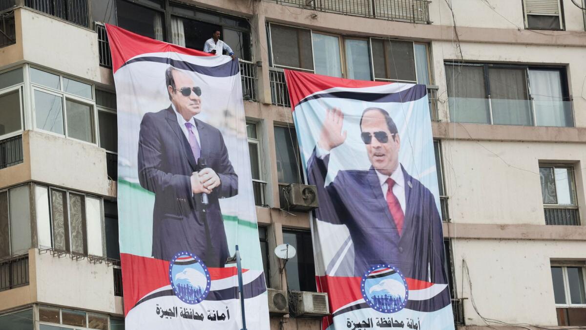 Huge posters of Egyptian President Abdel Fattah Al Sisi during a rally to back his candidacy in the presidential elections at Al Galaa Square in the Dokki district of Giza, Egypt. — Reuters