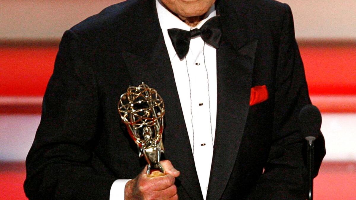 Bob Barker smiles onstage after winning the best game show award for 'The Price is Right'' at the 34th annual Daytime Emmy Awards in Hollywood, California, June 15, 2007. - Reuters File