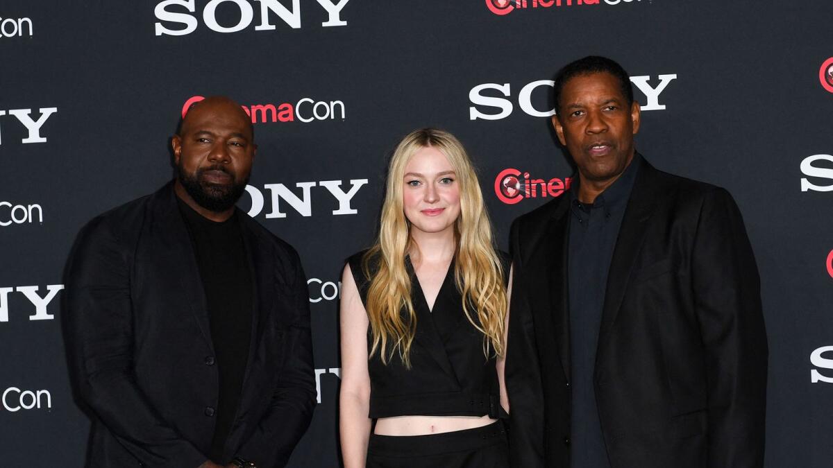 Director Antoine Fuqua, actors Denzel Washington and Dakota Fanning attend the Sony Pictures Entertainment presentation of 'The Equalizer 3'