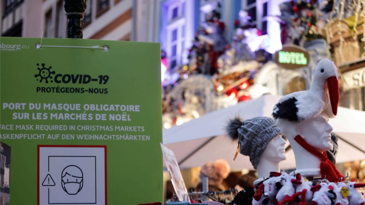 A board shows precautions to visit the Christmas market in Strasbourg, eastern France. — AP