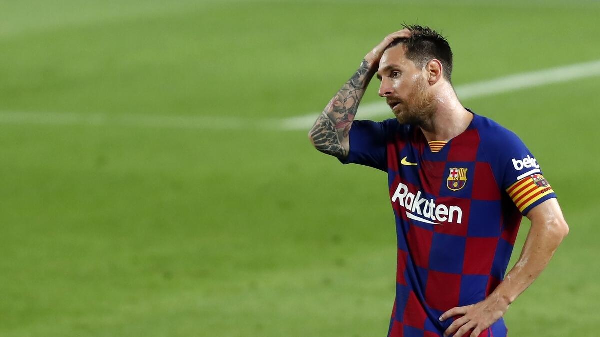 Barcelona's Lionel Messi reacts after the end of a Spanish La Liga match against Osasuna at the Camp Nou stadium