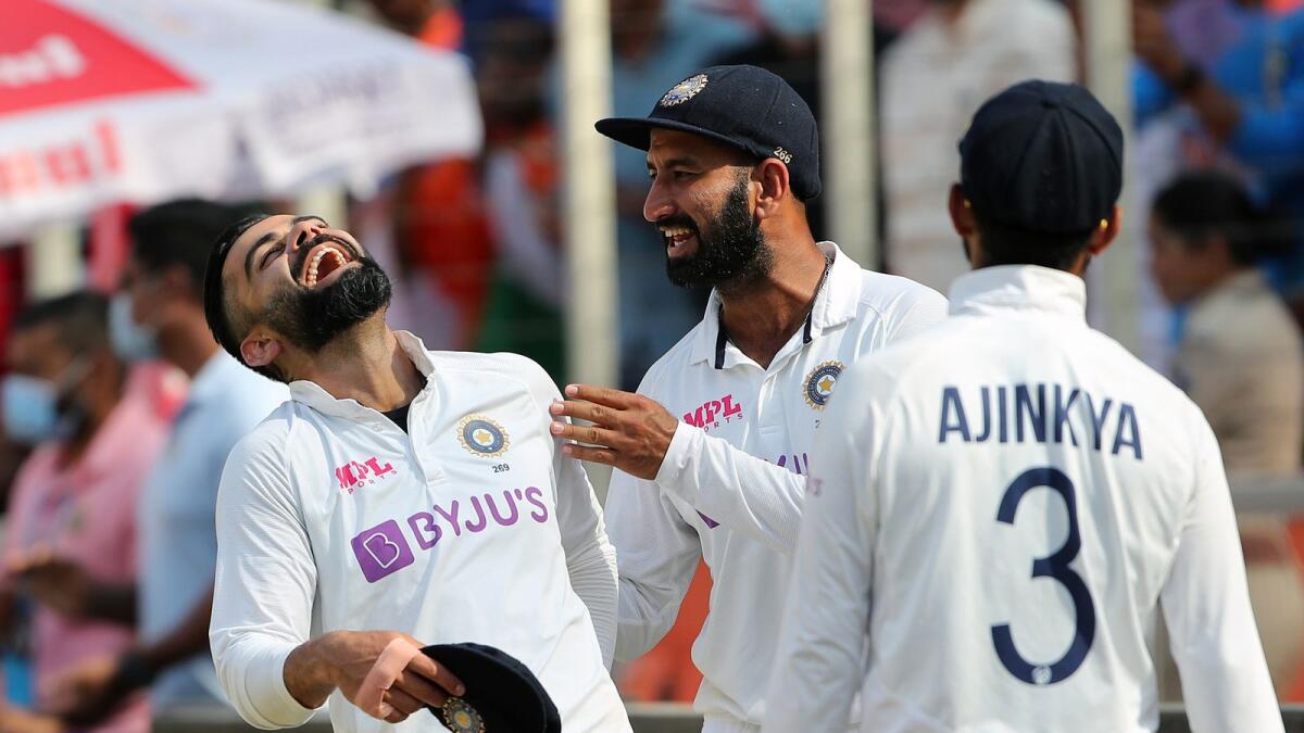 Indian skipper Virat Kohli and teammates celebrate a dismissal during the fourth Test match against England. — ANI
