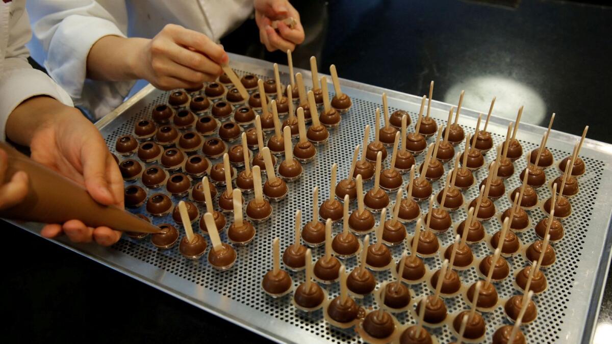 Empoyees of chocolate and cocoa product maker Barry Callebaut in Zurich. — Reuters file