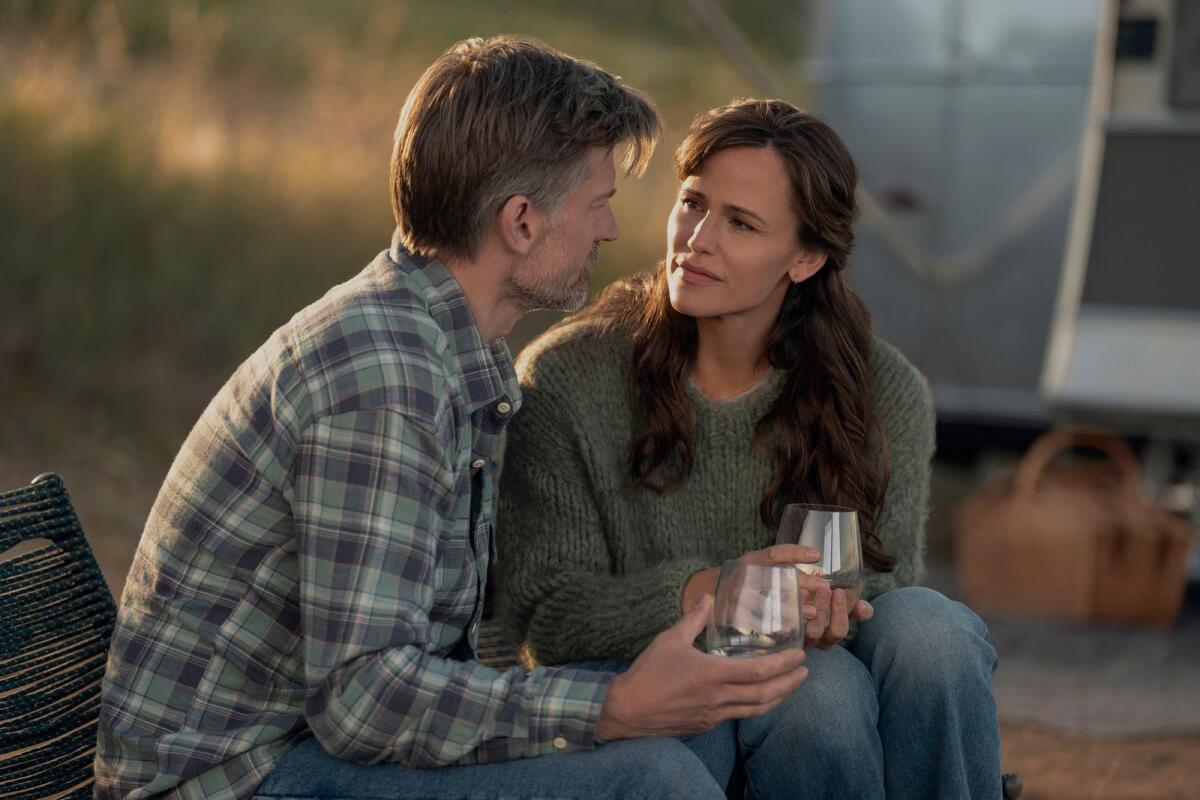 Nikolaj Coster-Waldau and Jennifer Garner in a scene from 'The Last Thing He Told Me'
