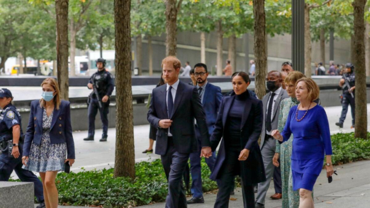 Britain's Prince Harry and Meghan walk while visiting the 9/11 Memorial in Manhattan, New York City. — Reuters
