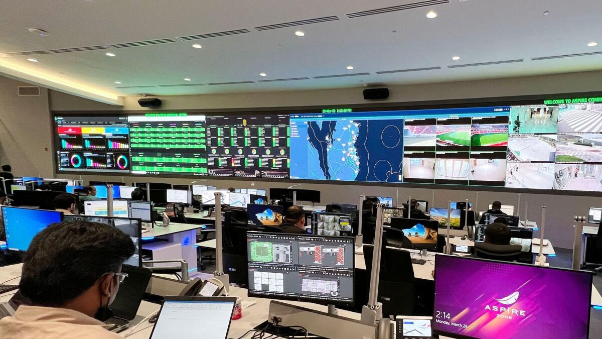 Staff work at the Aspire security command centre for the Fifa World Cup Qatar 2022, near Khalifa International stadium in Doha, where operation and security teams will be able to monitor all the stadiums during the World Cup. — AFP