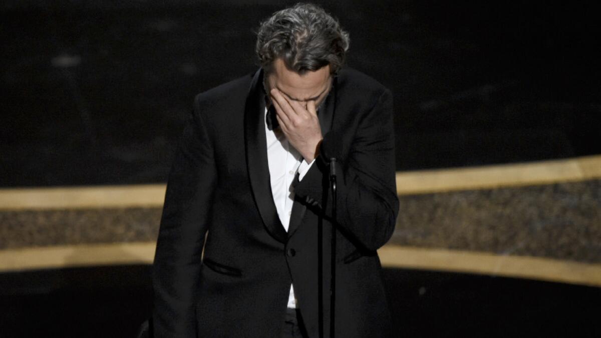Joaquin Phoenix capped his awards season sweep with his first Oscar on Sunday for 'Joker,' besting a packed field of nominees that included Antonio Banderas, Leonardo DiCaprio, Adam Driver and Jonathan Pryce.His first Academy Award follows months of controversy over the arthouse origin story about Batman’s nemesis, which stoked fears of inciting violence even as it hoarded nominations and awards.
