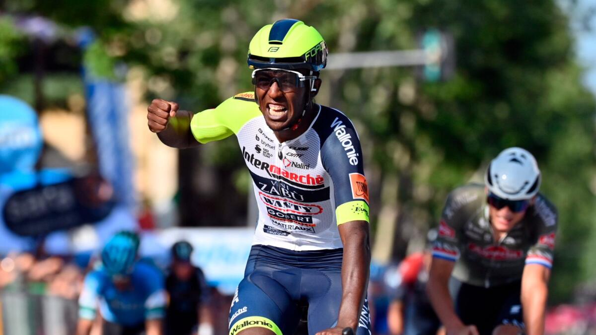 Eritrea's Biniam Girmay celebrates after winning the 10th stage of the Giro d'Italia. (AP)