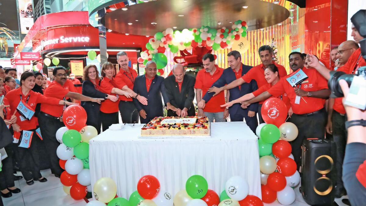 The Dubai Duty Free executive team came together for the ceremonial cutting of the 39th anniversary cake in Concourse C.