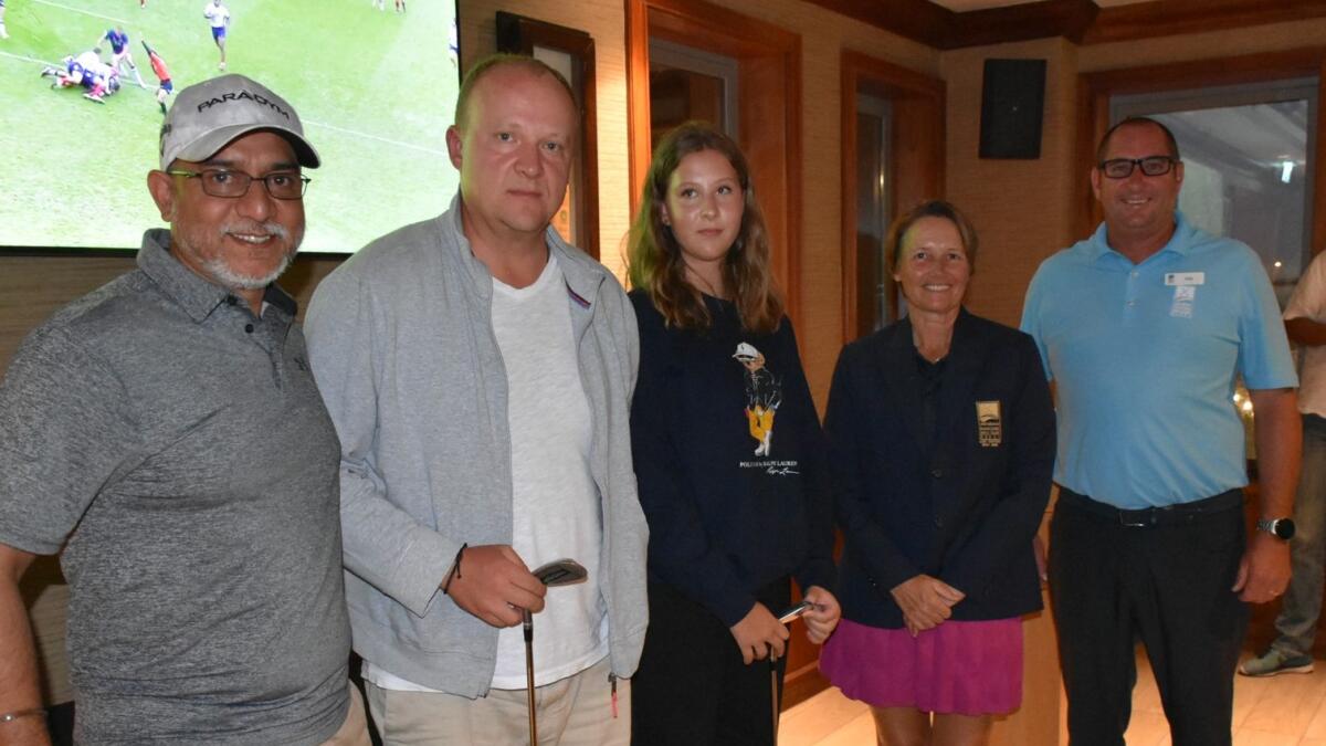 Left to right: B.S. Bali, winners Denis Rozhko and Milana Rozhko, Lady Club Captain Nicola Breeze, and Golf Operations Manager Ryan Smith. - Supplied photo