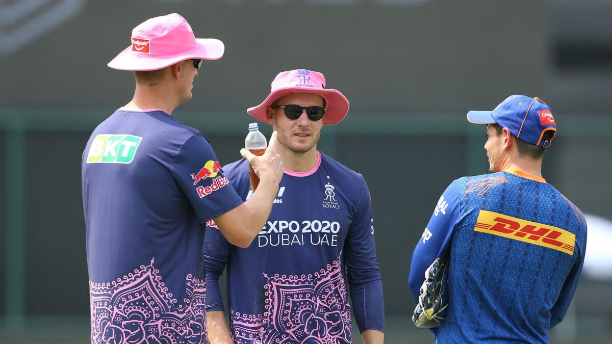 Chris Morris and David Miller of the Rajasthan Royals  talk to Quinton de Kock of the Mumbai Indians ahead of their Indian Premier League match on Thursday. (BCCI)