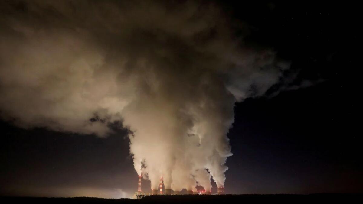 Smoke and steam billow from Poland's Belchatow Power Station, Europe's largest coal-fired power plant