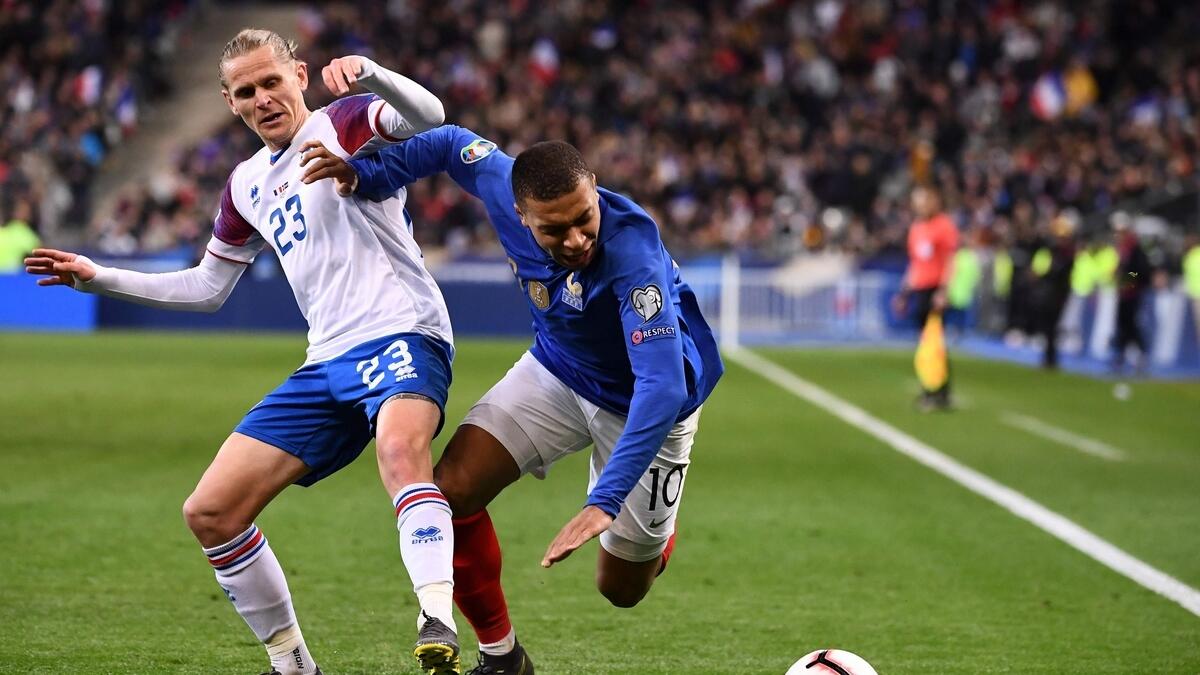 Mbappe leads France rout, Ronaldo injured in Portugal draw