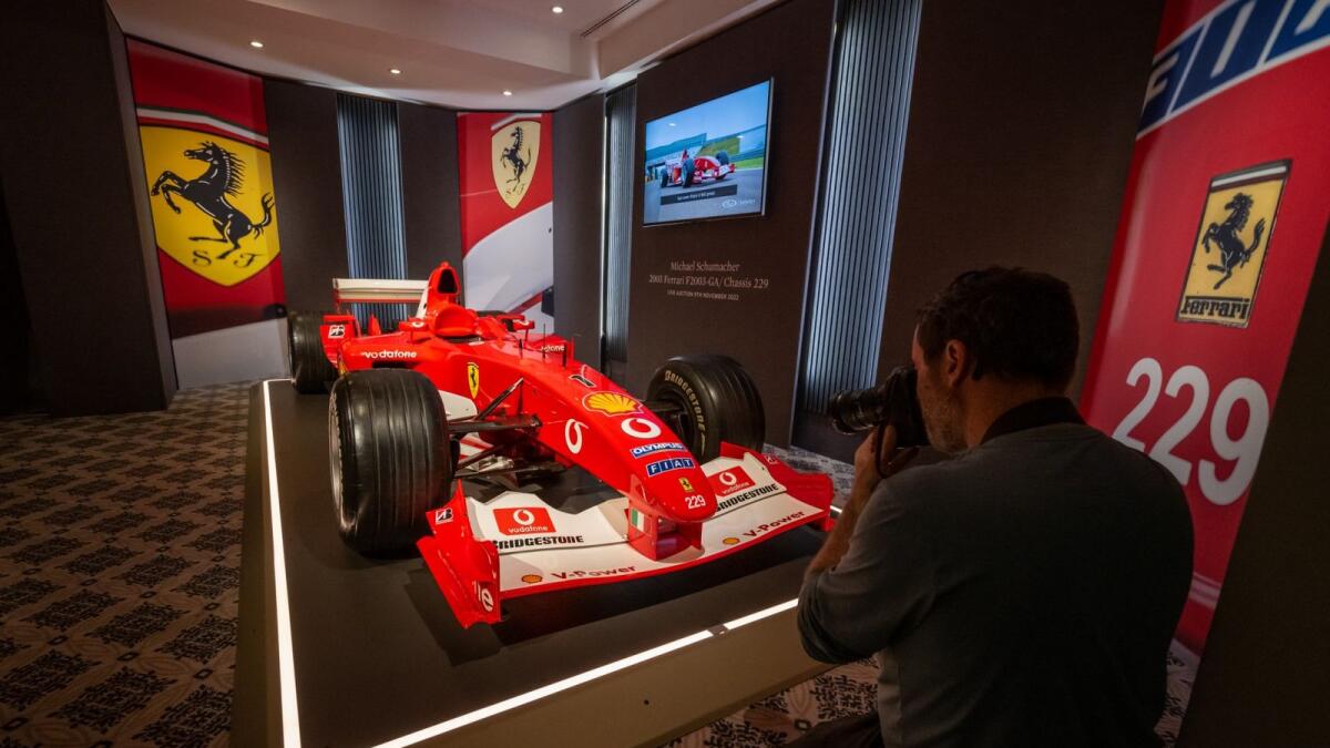 F1 World Champion Michael Schumacher's Formula One Ferrari F2003 GA with chassis number 229 seen at Sotheby's auction house  preview in Geneva. – AFP