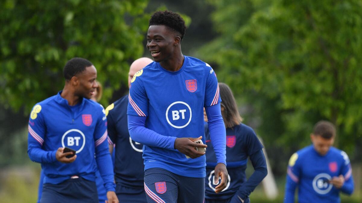 England midfielder Bukayo Saka (centre) during a training session at St George's Park. (AFP)