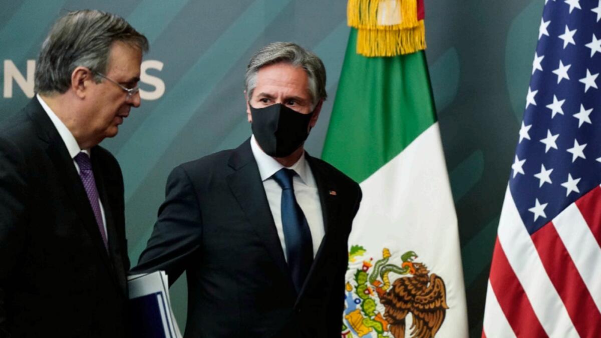 US Secretary of State Antony Blinken departs with Mexico's Foreign Minister Marcelo Ebrard after a joint news conference. — AP