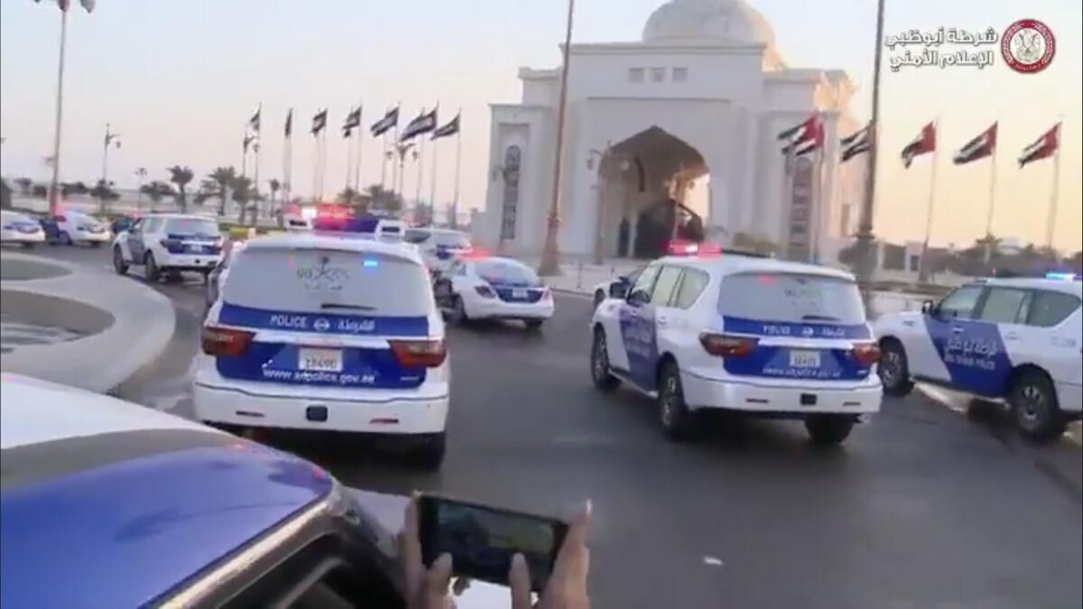 abu dhabi police, light, up, cars, celebrate, Saudi arabia, national day
