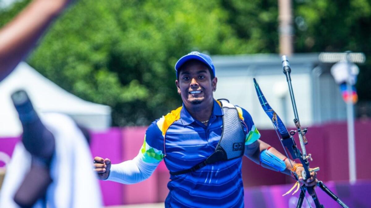 India's Atanu Das celebrates after beating 2012 Olympic champion Oh Jin-Hyek at the Tokyo Olympics on Thursday. (World Archery Twitter)