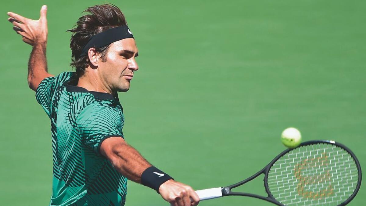 Federer on course for No. 1, says Wawrinka