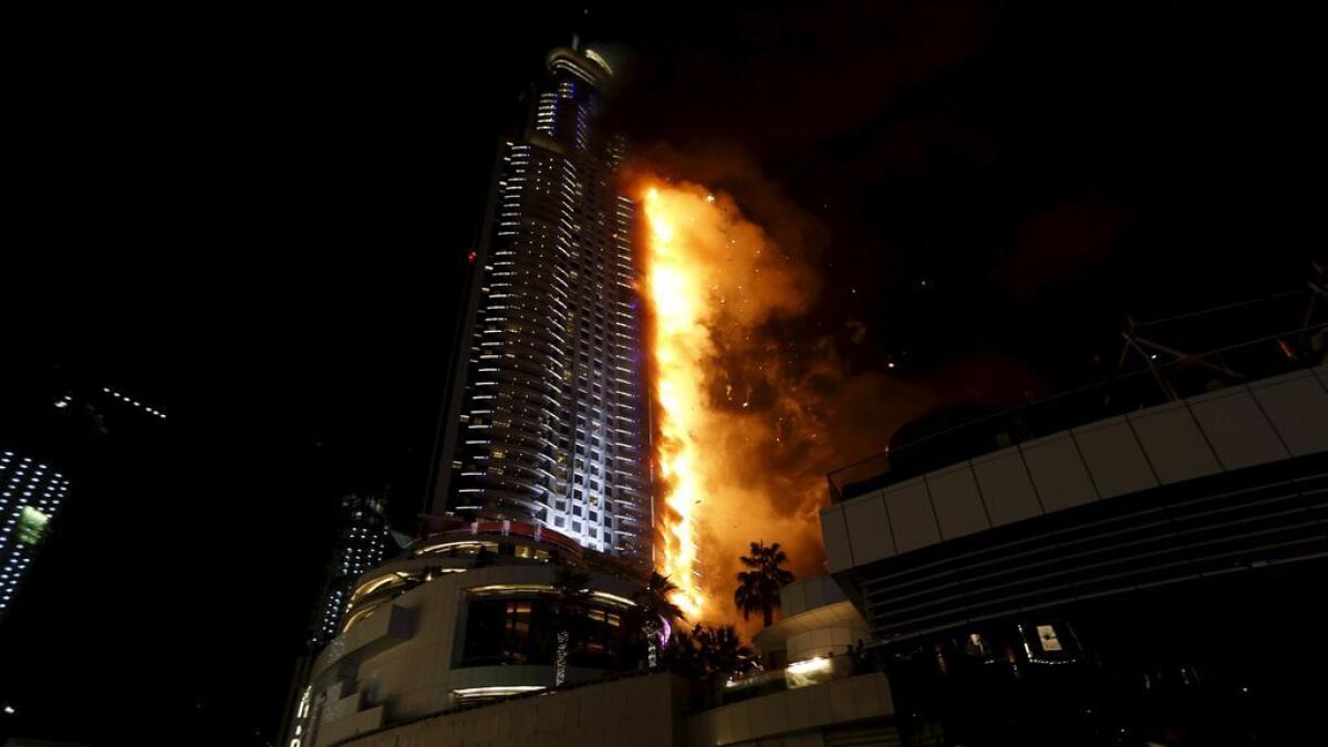 A fire engulfs The Address Hotel in downtown Dubai. 